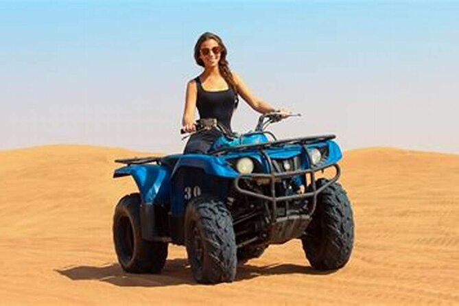 Doha Desert Safari Camel Ride Dune Bashing and ATV Bike - ATV quad biking and sandboarding: doing instead of watching