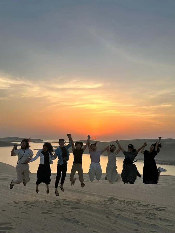 Doha Desert Safari, Camel Ride, Sandboarding & Inland Sea - Sandboarding on the dunes: fun with an easy rule