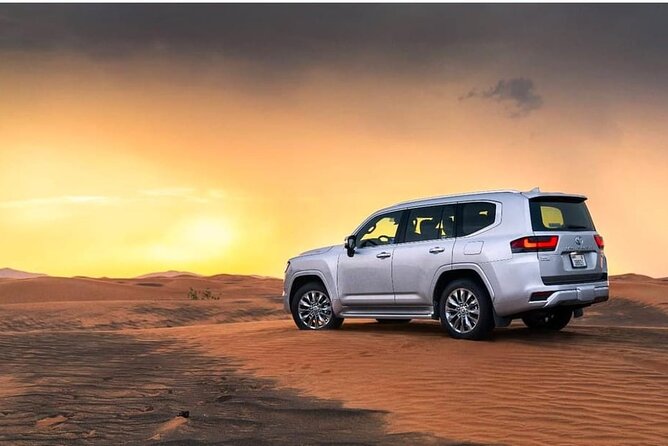 Doha: Desert Safari: Dune Bashing, Quad Bikes & Camel Rides - Tourist point sandboarding and dune bashing: where the adrenaline peaks