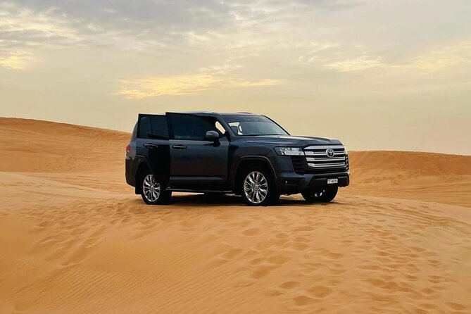 Doha: Desert Safari: Dune Bashing, Quad Bikes & Camel Rides - Guides and safety: why names like Karim, Nomii, Tariq, and Asim matter