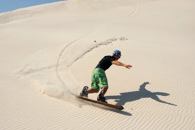Doha Desert Safari Dune bashing,Sandboarding,CamelRide,Inland Sea - Sandboarding: the easy way to play in the sand