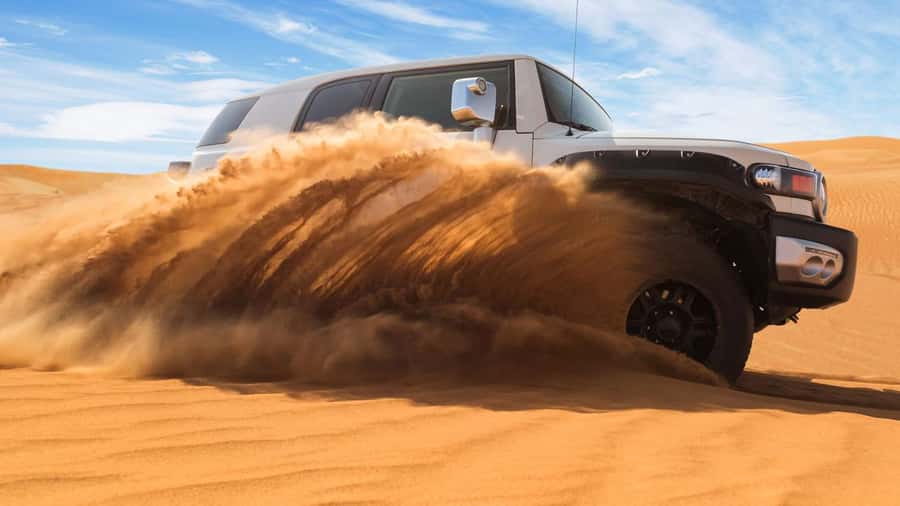 Doha: DesertSafari with Quad Bike, Camel Ride & Sandboarding - Inland Sea (Khor Al Adaid) visit: the sunset-worthy reset