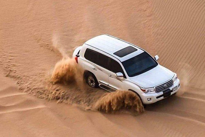 Doha :Half Day Desert Safari | Camel Riding | ATV | Sand Surfing - Sealine Beach stop: tea, coffee, and the camel ride option