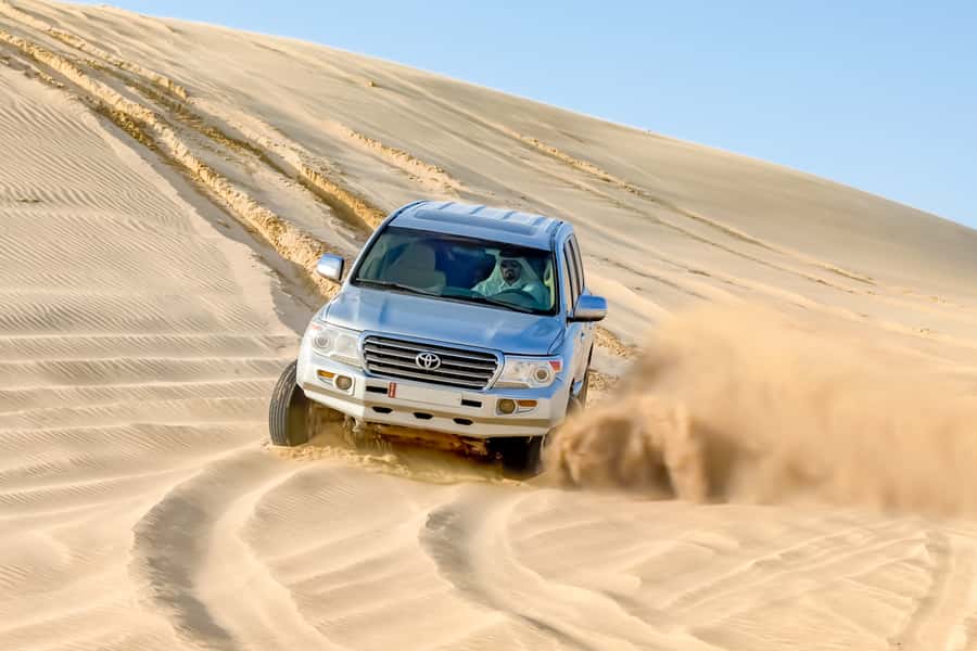 Doha: Half-Day Desert Safari, Quad Bike, Camels & Inland Sea - Inland Sea Stop: A Quick Change From Sand to Water