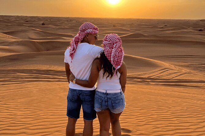 Doha Half Day Desert Safari with Camel Ride and Sand Boarding - Khor Al Udaid Inland Sea: sandboarding plus photography time