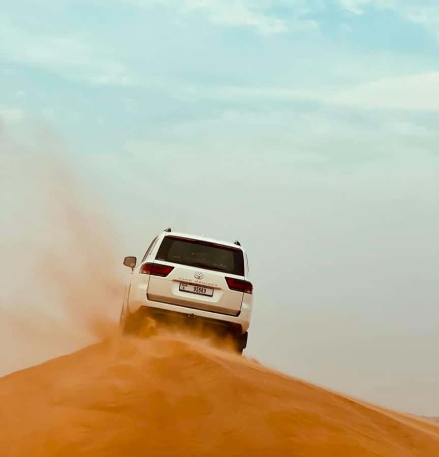 Doha: Half Day Layover Desert Safari, Camel Ride, SandBoard - Dune bashing and sand-boarding: the main event in 4WD