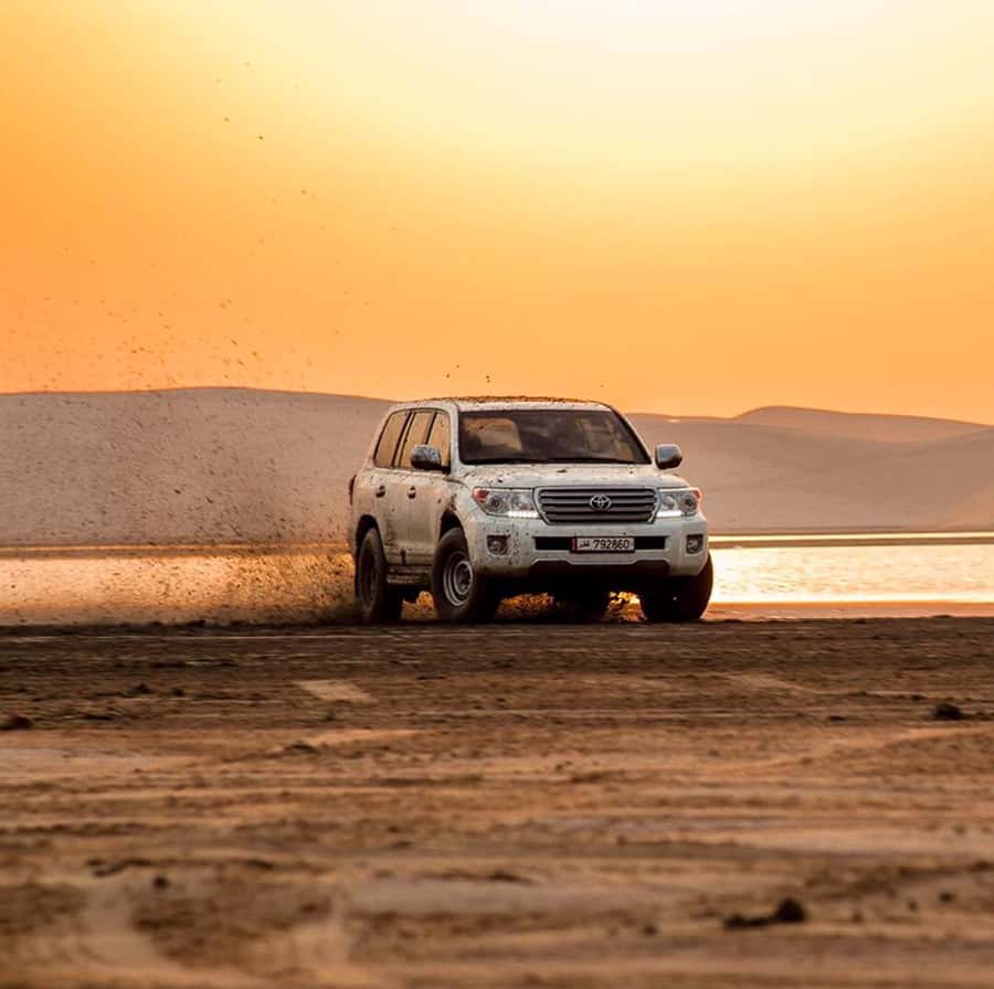 Doha: Inland Sea, Desert Safari, Camel Ride and Sandboarding - The Inland Sea stop: dunes meet turquoise water
