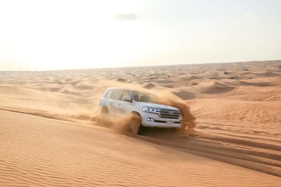 Doha: Safari, ATV, Camels, Sandboarding and Inland Sea Tour - Dune Bashing in a Deflated-Tire 4WD: The Main Event