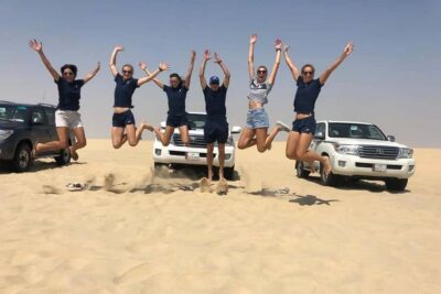 Doha Safari: ATV Ride, Dune Bashing, & Sandboarding Fun - The drive out of Doha: oil refineries to open sand