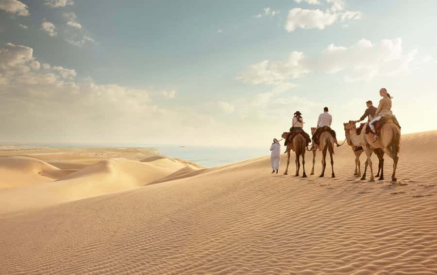 Doha:Sunrise or Sunset Desert Safari Tour with Sand Boarding - The Doha Pickup to Desert Drive: Trading City Noise for Open Space