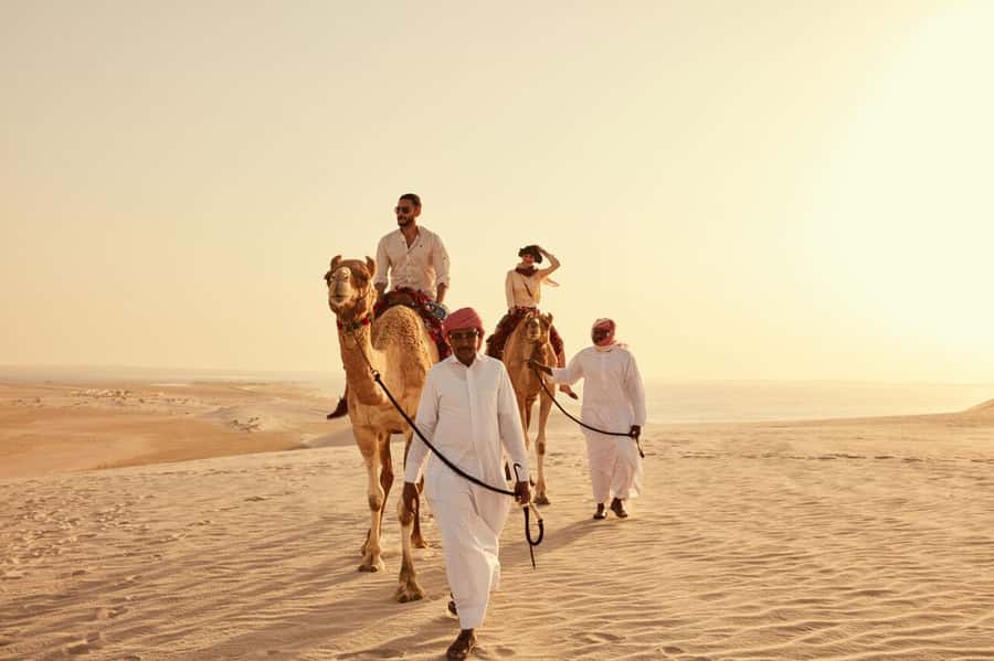 Doha:Sunrise or Sunset Desert Safari Tour with Sand Boarding - Sandboarding Included: Fun, Fast, and Surprisingly Addictive