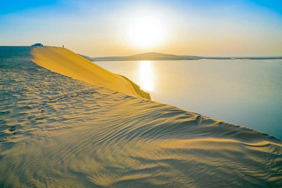 Doha: Sunset Desert Safari, ATV, Camel Ride and Sandboarding - The inland sea stop at Khor Al Adaid: where the photos earn their keep