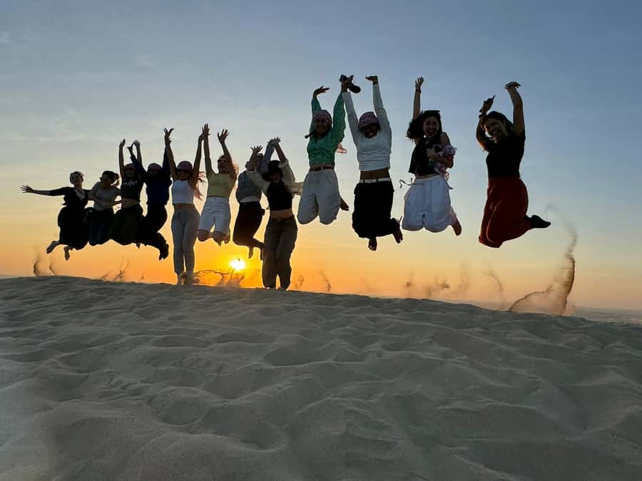 Doha: Sunset Safari, Dune Bashing, Sandboarding & Camel Ride - Inland Sea Beach stop: where the desert day starts to feel real