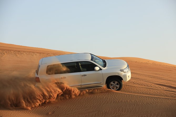 Dubai: Adventure Evening Desert Safari, Camel Ride, Shows & BBQ Dinner - The 4x4 Dune Bashing and Sandboarding Sequence