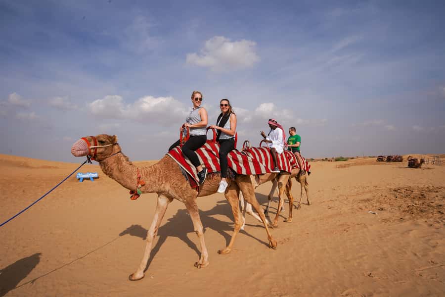 Dubai: Adventure Quad Bike Safari, Camel Ride & Refreshment - Quad bike, sandboard, camel: the smart way to do Dubai desert thrills