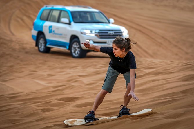 Dubai: Adventure Quad Bike Safari, Camel Ride & Refreshments - Camel ride across the sands: tradition, photo moments, and an ethics check