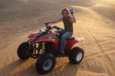 Dubai: ATV Ride and Desert Safari Drive (Morning Adventure) - Pickup and the shared-quad reality (1 bike per 2 riders)