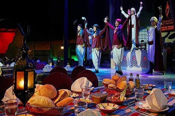 Dubai City Tour and Evening Desert Safari Combo - Al Khayma Premium Camp: camel moments, henna, shisha, and the big dinner spread