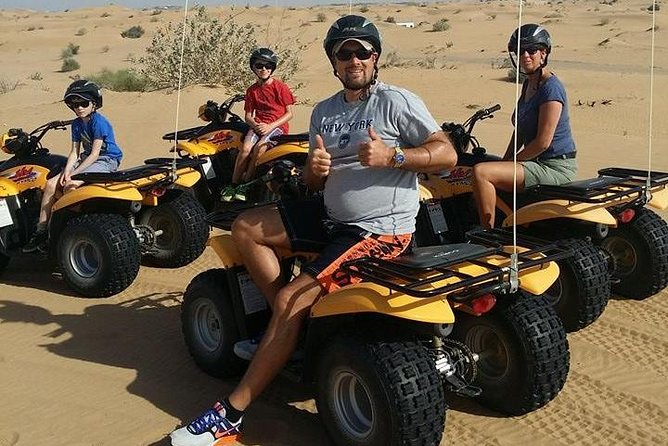Dubai Desert Afternoon Quad Safari with Camel Ride, BBQ Dinner and Belly Dancing - From Central Dubai to the Sands: Pickup That Works for an Afternoon Trip
