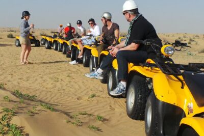 Dubai Desert Afternoon Quad Safari with Camel Ride, BBQ Dinner and Belly Dancing - ATV Quad Safari at Sand Trax: Safety Gear and Real Ride Time