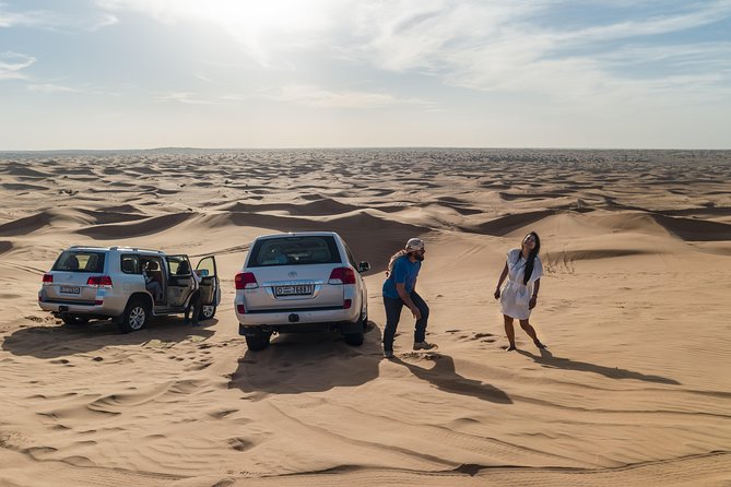 Dubai Desert Discovery: Red Dunes Safari, Sandboard & Camel Ride - Sandboarding on the dunes: beginner-friendly slides, real satisfaction