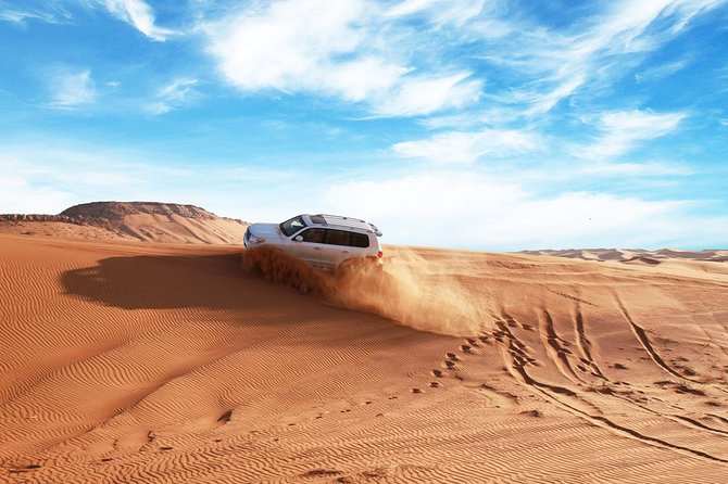 Dubai Desert Journey: Red Dunes Safari with BBQ in Bedouin Camp - The heart of the day: 45-minute dune bashing in a 4WD