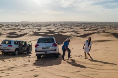 Dubai Desert Journey: Red Dunes Safari with BBQ in Bedouin Camp - Sunset timing, sandboarding, and the best photo moments