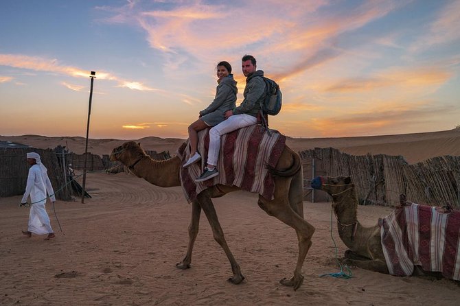 Dubai Desert Journey: Red Dunes Safari with BBQ in Bedouin Camp - Belly dancing, Tanura, and fire show at night
