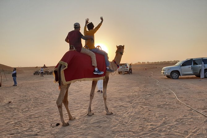 Dubai: Desert Safari 4x4 Dune with Camel Riding and Sandboarding - The camel-and-camp transition: sunset photos, henna, and sweet fuel