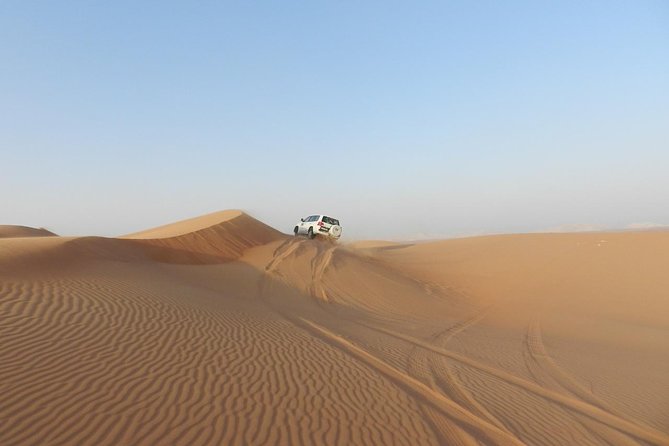 Dubai Desert Safari, ATV open desert, Camel ride, Shows & BBQ - BBQ Buffet Under the Stars: What to Expect From Dinner and Drinks