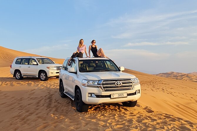 Dubai Desert Safari & Buffet Dinner and Camel ride with PRIVATE CAR - Inside the Bedouin camp: camel ride, henna, shisha, and shows