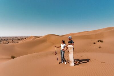 Dubai Desert Safari: Camel Ride, Sandboarding, BBQ & House Drinks - Dubai Desert Conservation Reserve: falconry, sunset stops, and what the reserve means