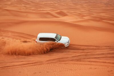 Dubai Desert Safari, Dune Bashing, Camel Ride, Sandboarding & BBQ - Dune bashing in the 4x4: the thrilling part, with real comfort tips