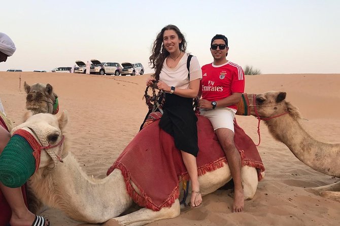 Dubai Desert Safari, Evening at Red-Dunes, 5<em> BBQ Dinner – Key things to know before you go’ /></p>
<ul>
<li><strong>3 pm start, desert night finish</strong>: timing is built around sunset and evening shows.</li>
<li><strong>4×4 dune bashing + sandboarding</strong>: you get both, plus camp-side extras.</li>
<li><strong>Buggy, ATV, or dune buggy options add variety</strong>: a 30-minute ride window is included with that stop.</li>
<li><strong>Henna + camel ride</strong>: quick, classic desert-camp touches, not just entertainment.</li>
<li><strong>Dinner is a live buffet</strong>: non-veg and veg BBQ options, plus coffee/tea and soft drinks.</li>
<li><strong>Ramadan note</strong>: belly dance is not included during Ramadan month.</li>
</ul>
<h2 id="entering-the-red-dunes-evening-circuit">Entering The Red-Dunes Evening Circuit</h2>
<p> BBQ Dinner – Entering The Red-Dunes Evening Circuit’ /><br />
This desert safari runs from <strong>3:00 pm</strong> and lasts about <strong>6 to 7 hours</strong>, looping back to the meeting point afterward. That mid-afternoon start matters because it lets the desert shift from hot daylight to cooler evening temps, which makes the ride and camp time more comfortable.</p>
<p><p>The whole experience is set up as a one-stop evening plan. You’re picked up from your hotel or location, transported in an <strong>air-conditioned 4×4 Land Cruiser</strong>, then taken through dune activities and into the camp where the <strong>BBQ dinner and entertainment</strong> are already scheduled.</p>
</p>
<p><p>The camp experience is designed for motion, not museum-stillness. Even if you’re not the most daring person, you’ll still get a hand on the desert through activities like sandboarding and henna, plus the short camel ride.</p>
</p>
<div style="margin: 20px 0; padding: 15px 0;"><p>You can also read our reviews of more tours and experiences in Dubai.</p><ul style="margin: 10px 0; padding: 0; list-style: none;"><li style="margin: 0 0 10px 0; padding: 0 0 10px 0; border-bottom: 1px solid #eee; display: flex; align-items: flex-start; gap: 12px; line-height: 1.4;"><a href="https://bookthatsafari.com/dubai-desert-safari-quad-bike-camel-ride-al-khayma-camp/" aria-hidden="true" tabindex="-1"><img decoding="async" style="width: 80px; height: 60px; object-fit: cover; border-radius: 4px; flex-shrink: 0;" src="https://3.bookthatsafari.com/wp-content/uploads/dubai-desert-safari-quad-bike-camel-ride-al-khayma-camp-150x150.jpg" alt="" loading="lazy"></a><div><a href="https://bookthatsafari.com/dubai-desert-safari-quad-bike-camel-ride-al-khayma-camp/">Dubai: Desert Safari, Quad Bike, Camel Ride & Al Khayma Camp</a><br><span style="font-size: 0.82em; color: #555; margin-top: 2px;"><span style="color: #f5a623;">★</span> 4.9 · 68,962 reviews</span></div></li><li style="margin: 0 0 10px 0; padding: 0 0 10px 0; border-bottom: 1px solid #eee; display: flex; align-items: flex-start; gap: 12px; line-height: 1.4;"><a href="https://bookthatsafari.com/dubai-desert-safari-quad-bike-camel-ride-and-sandboarding/" aria-hidden="true" tabindex="-1"><img decoding="async" style="width: 80px; height: 60px; object-fit: cover; border-radius: 4px; flex-shrink: 0;" src="https://3.bookthatsafari.com/wp-content/uploads/dubai-desert-safari-quad-bike-camel-ride-and-sandboarding-150x150.jpg" alt="" loading="lazy"></a><div><a href="https://bookthatsafari.com/dubai-desert-safari-quad-bike-camel-ride-and-sandboarding/">Dubai: Desert Safari, Quad Bike, Camel Ride and Sandboarding</a><br><span style="font-size: 0.82em; color: #555; margin-top: 2px;"><span style="color: #f5a623;">★</span> 4.9 · 43,505 reviews</span></div></li><li style="margin: 0; padding: 0; border-bottom: none; display: flex; align-items: flex-start; gap: 12px; line-height: 1.4;"><a href="https://bookthatsafari.com/dubai-safari-quad-bike-camel-ride-and-buffet-dinner/" aria-hidden="true" tabindex="-1"><img decoding="async" style="width: 80px; height: 60px; object-fit: cover; border-radius: 4px; flex-shrink: 0;" src="https://3.bookthatsafari.com/wp-content/uploads/dubai-safari-quad-bike-camel-ride-and-buffet-dinner-150x150.jpg" alt="" loading="lazy"></a><div><a href="https://bookthatsafari.com/dubai-safari-quad-bike-camel-ride-and-buffet-dinner/">Dubai: Safari, Quad Bike, Camel Ride, and Buffet Dinner</a><br><span style="font-size: 0.82em; color: #555; margin-top: 2px;"><span style="color: #f5a623;">★</span> 4.9 · 33,424 reviews</span></div></li></ul></div><h2 id="pickup-in-a-4x4-land-cruiser-why-air-conditioning-matters">Pickup In A 4×4 Land Cruiser: Why Air Conditioning Matters</h2>
<p><img width="670" height="446" decoding="async" src=
