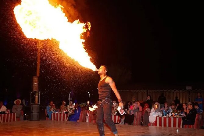 Dubai Desert Safari: Quad Bike, Camel Ride and BBQ Dinner - BBQ Buffet Dinner Plus Tanoura and Fire Show: How the Night Wraps Up