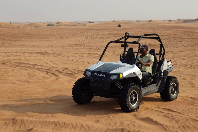 Dubai Desert Safari, Quad Bike, Camel Ride, and Buffet Dinner - Lahbab dunes: dune bashing, sandboarding, and optional quad bike