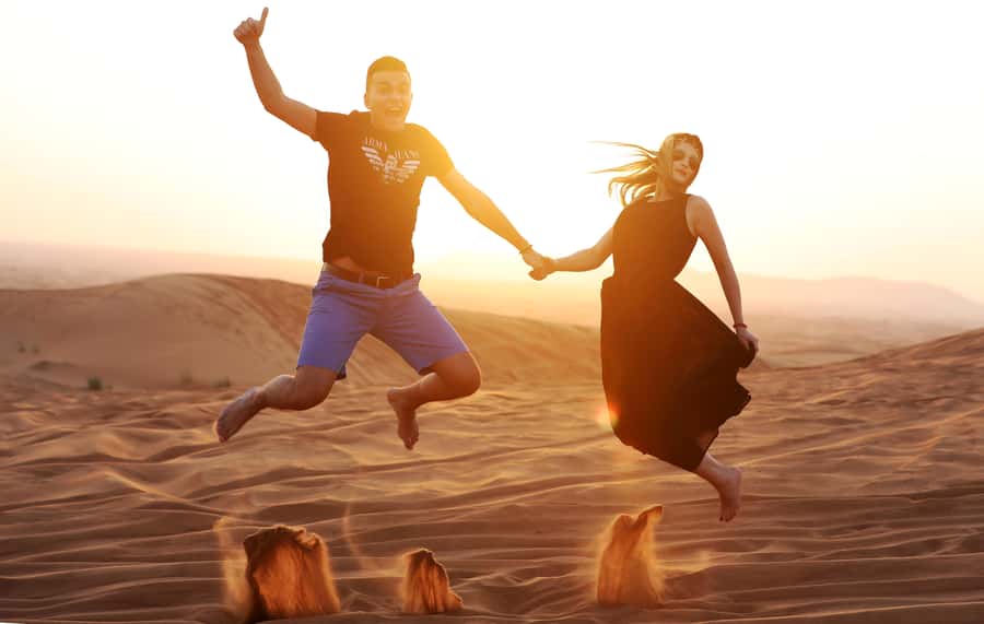 Dubai: Desert Safari, Quad Bike, Sandboarding, Camels & BBQ - Sandboarding: The Fun Follow-Up to the Thrill Ride