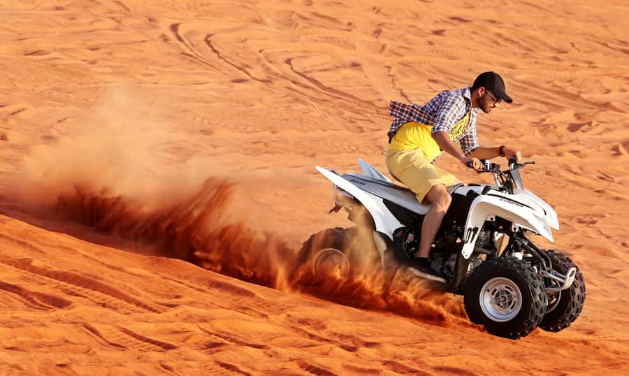 Dubai: Desert Safari, Quad Bike, Sandboarding, Camels & BBQ - Camp Arrival: Dates, Arabic Coffee, and That First Desert Welcome