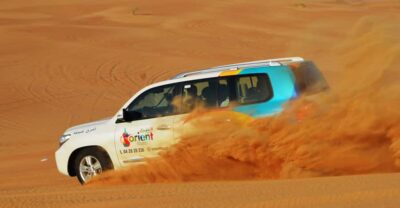 Dubai Desert Safari, Quad Biking, Camel Ride, & Sandboarding - Pickup and the Land Cruiser Ride: Getting to Lahbab Desert