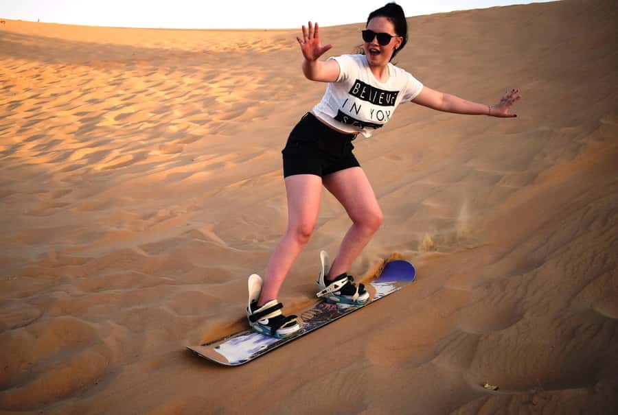 Dubai Desert Safari, Quad Biking, Camel Ride, & Sandboarding - The Big Night Shows: Tanoura, Fire Blower, and Belly Dance Timing