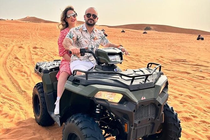 Dubai Desert Safari Sharing with Quad, Shows, Camel and Dinner - Dune Bashing in a 4x4: Adrenaline With a Real Guide