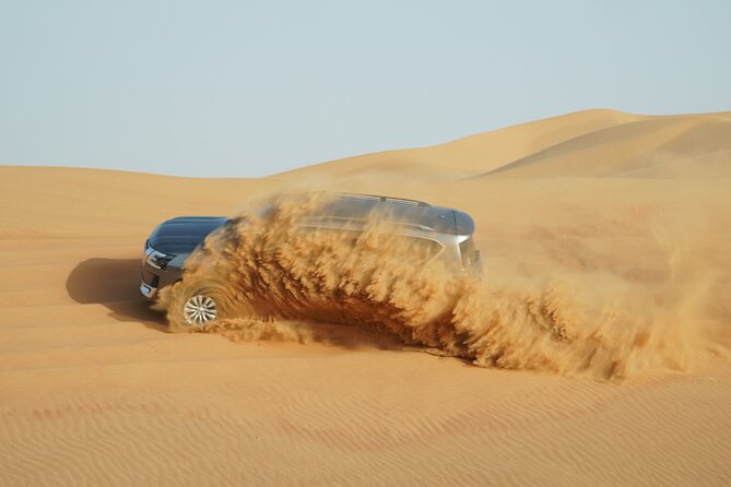 Dubai Desert Safari with 4x4 Cars, Live BBQ, Shows & Much more - The Shows at Camp: Tanura, Belly Dance, and Fire Shows