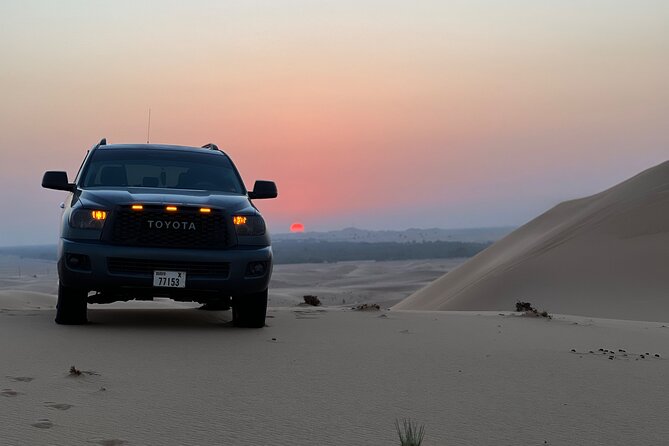 Dubai desert safari with 4x4 Dune Bashing,Camel Ride sand board - The Evening Switch: Unlimited Refreshments, Then BBQ Dinner