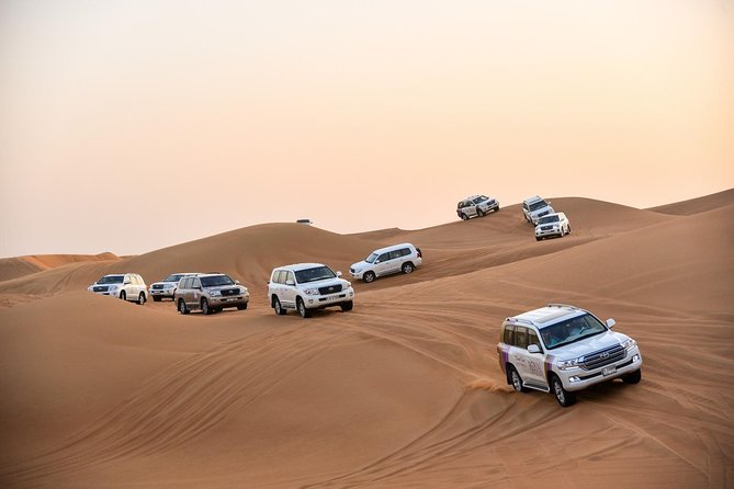 Dubai Desert Safari with BBQ And 4W Land Cruiser Dune Bashing Experience - From Dubai to the desert: pickup and first impressions