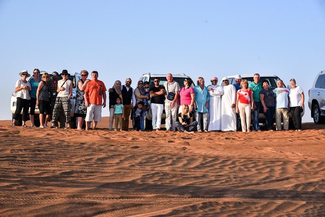 Dubai Desert Safari with BBQ and 4WD Land Cruiser Dune Bashing - Camel ride, possible sand boarding, and the sunset photography moment