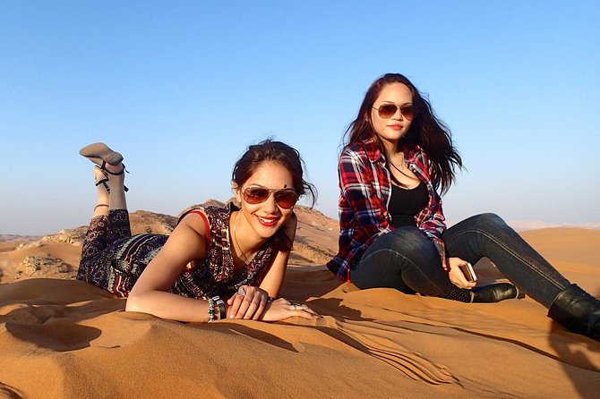 Dubai Desert Safari with BBQ Dinner Pickup from Ras Al Khaimah - Quad bikes and falcon photos: the add-ons that can change your budget