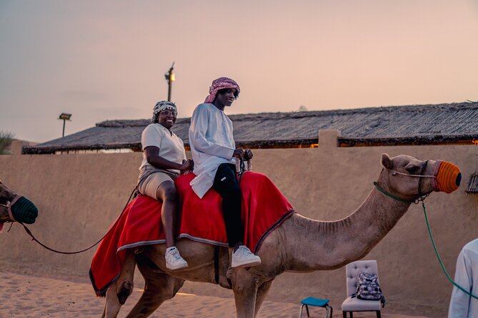 Dubai Desert Safari with BBQ, Dune, Live Shows - Camp Energy: Fire Show, Cameras, and ATV Moments