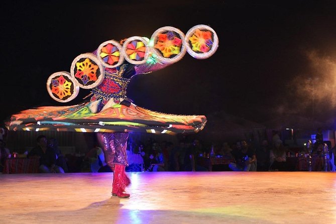 Dubai Desert Safari With BBQ, Quad Bike And Camel Ride - The entertainment show: tanoura, belly dance, and fire