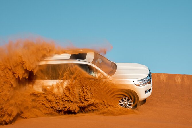 Dubai Desert Safari with Belly Dance, Fire Show and Tanura Show-The Full Package - Lahbab dune bashing: the main event starts fast