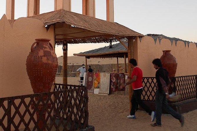 Dubai Desert Safari with Camel Ride, Show, BBQ and Transfers - 4x4 Dune Drive and Camel Ride: The Core of the Experience